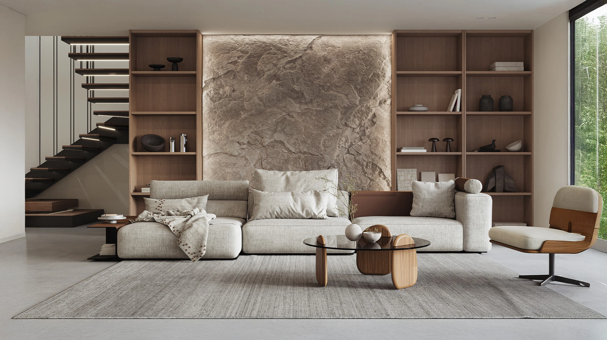 Salon moderne avec canapé en cuir noir trois places, table basse ronde plateau verre fumé et piètement bois clair croisé